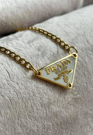 prada necklace triangle white and gold|Prada necklace triangle dupe.